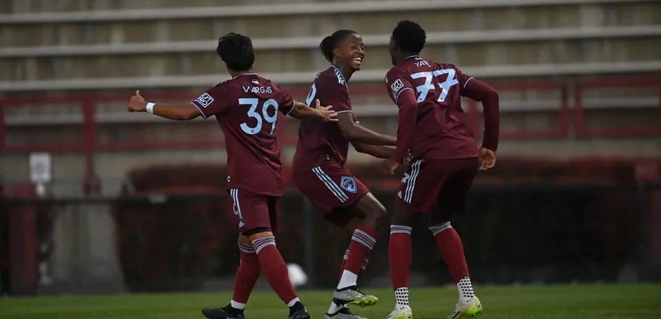 Colorado Rapids II players celebrating a goal