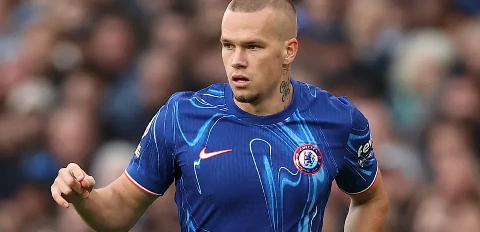 Player in blue Chelsea kit during match