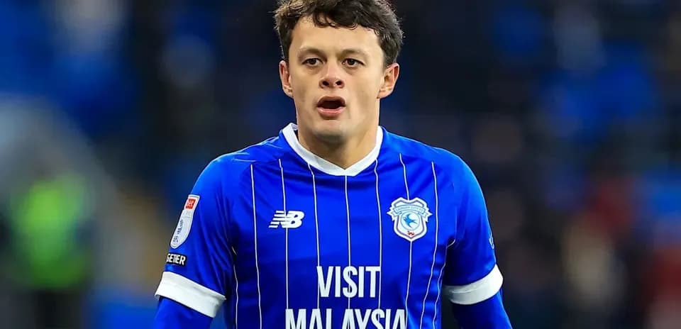 Player in blue jersey during football match