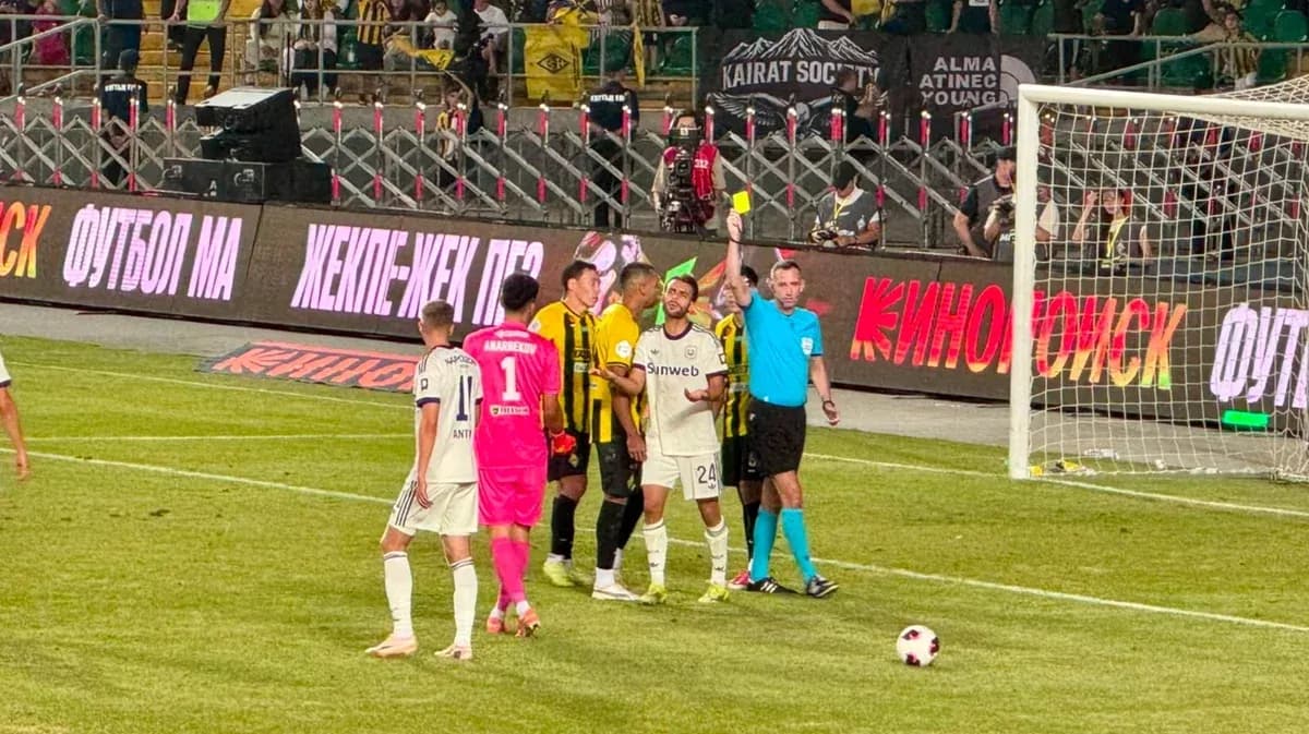 Players interacting during Anderlecht vs Kairat match