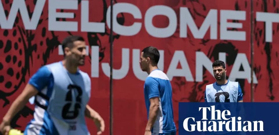Players training in front of a welcome sign