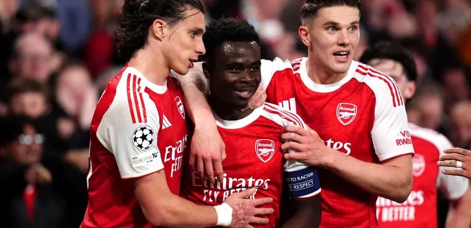 Arsenal players celebrating a goal together