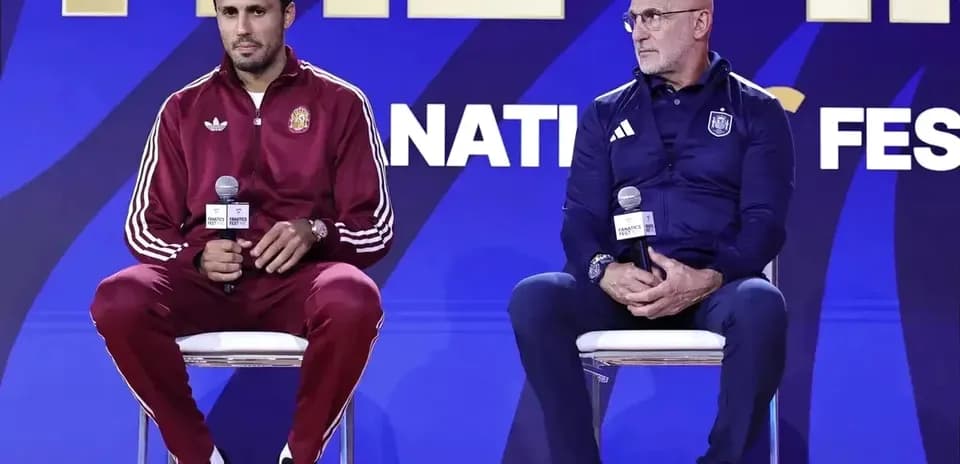 Two coaches speaking at press conference event
