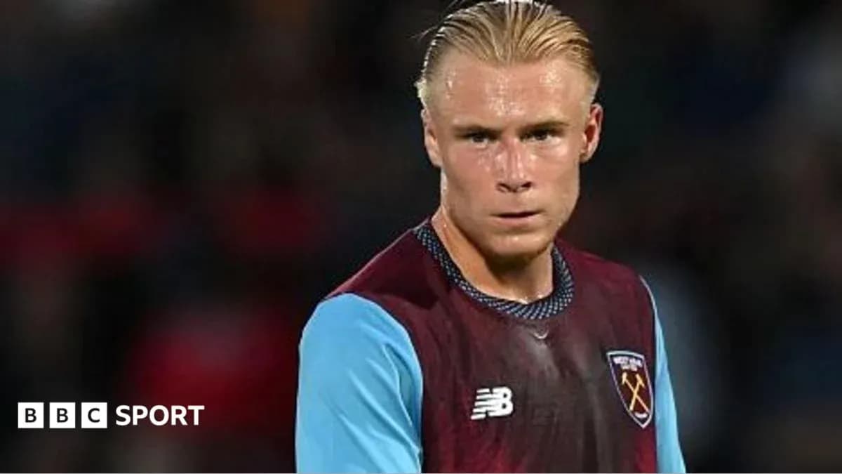 Player in West Ham kit during match action
