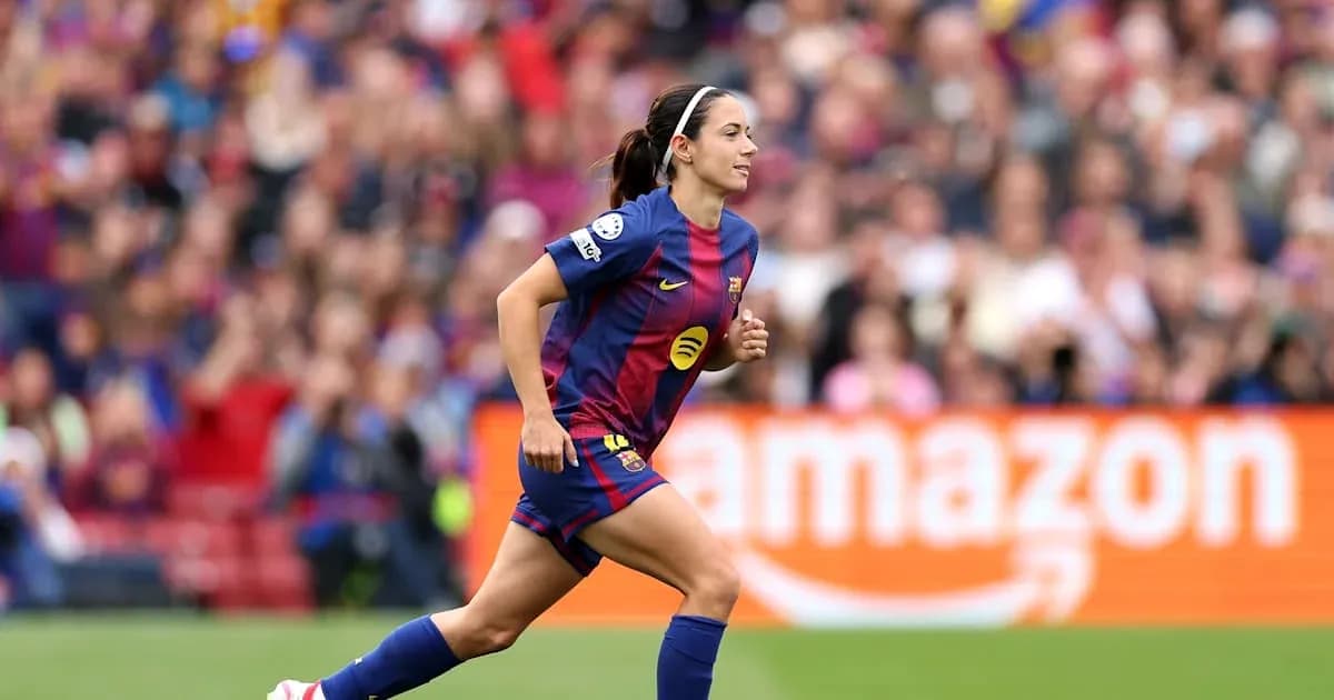 Barcelona player running during a match at stadium