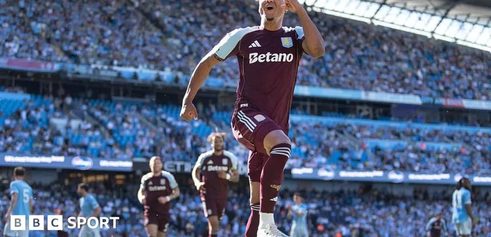 Aston Villa player celebrating a goal during match