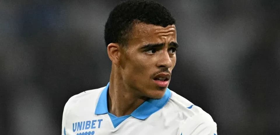 Player in white jersey during match action
