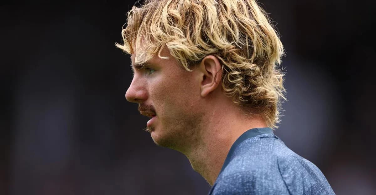 Player in profile during a match warm-up
