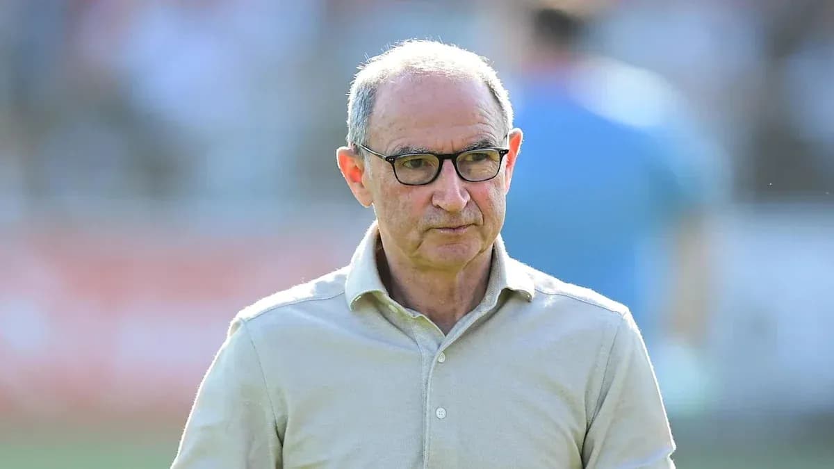 Coach observing the match from the sidelines