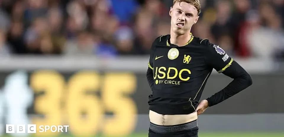 Player adjusting his shirt during a match