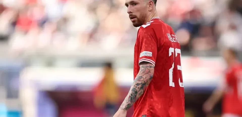 Player in red jersey during match action