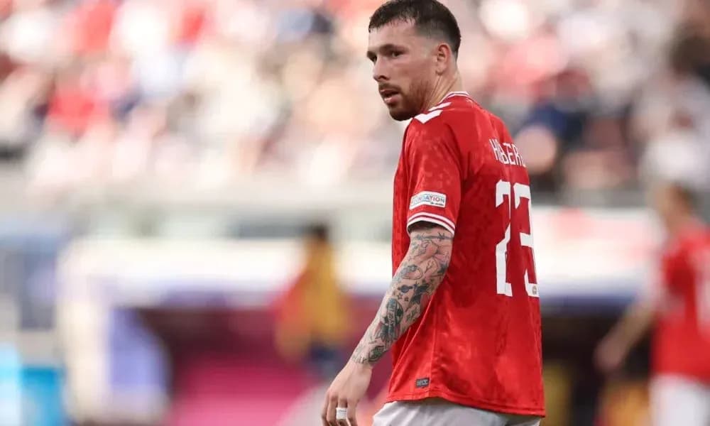 Player in red jersey during match action