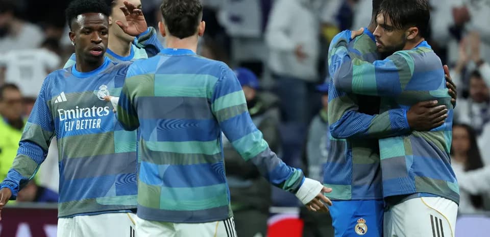 Real Madrid players embracing before the match