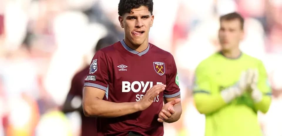 West Ham player applauding fans after match