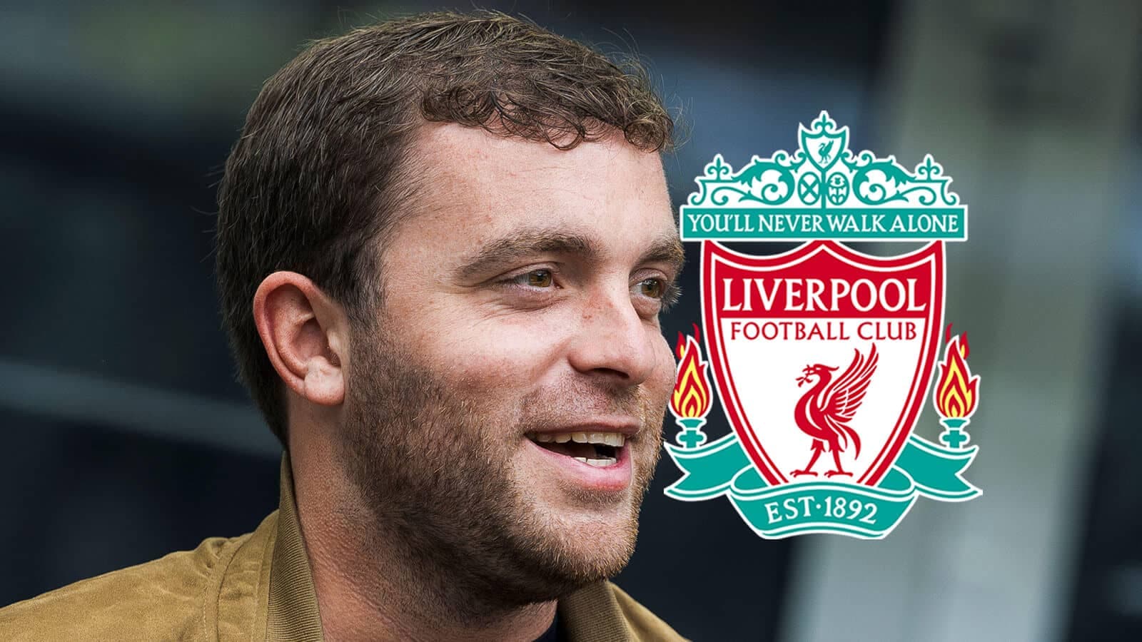 Person smiling beside Liverpool FC club logo