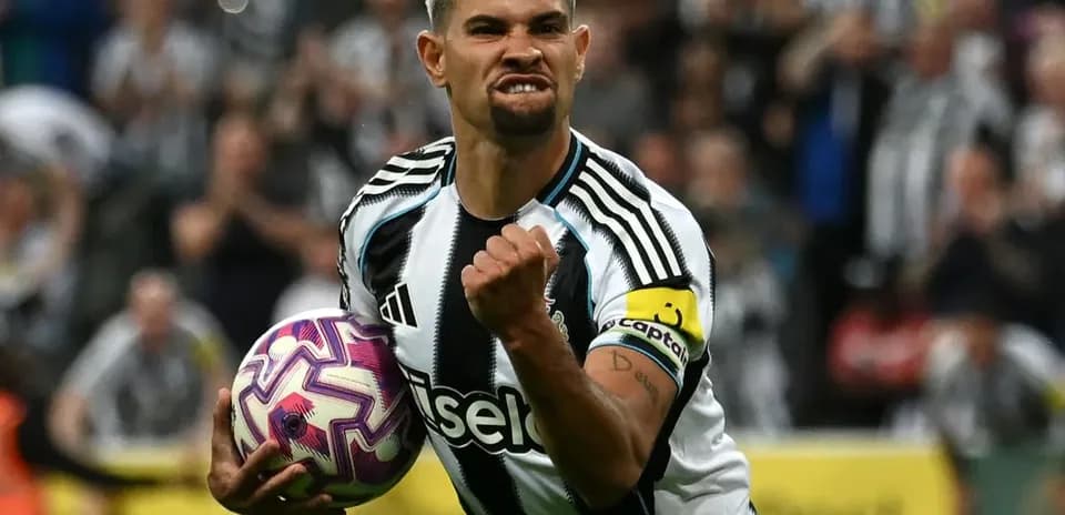 Player celebrating with the ball after scoring