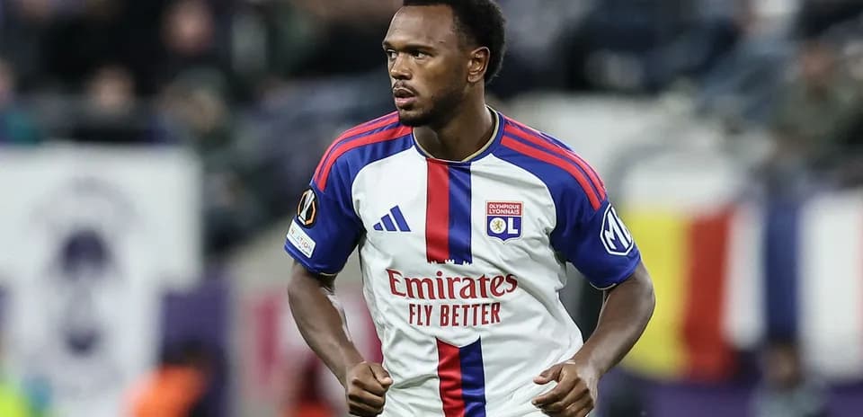 Player in Olympique Lyonnais jersey during match