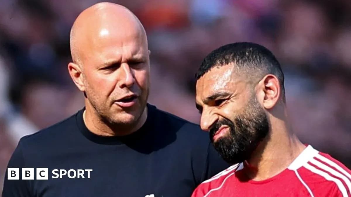 Coach discussing with player during match
