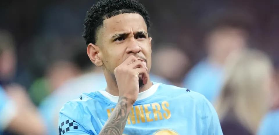 Player contemplating during match, wearing light blue jersey