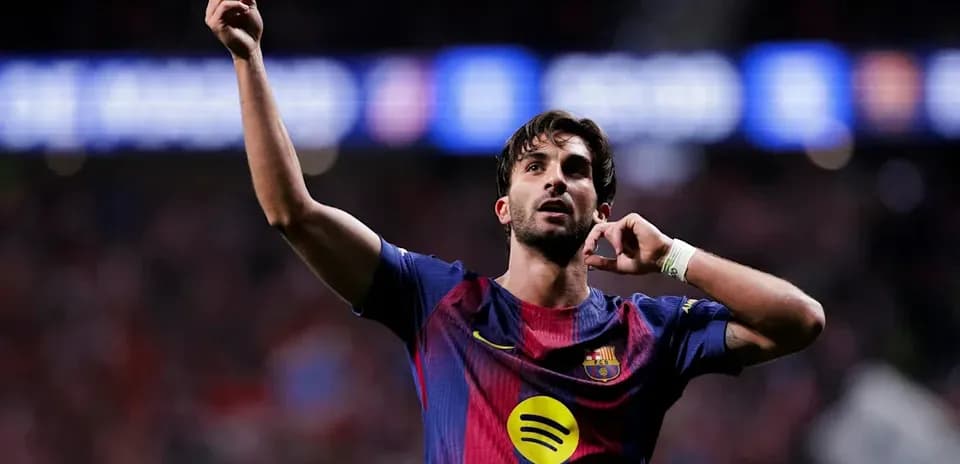 Player celebrating a goal for Barcelona at stadium