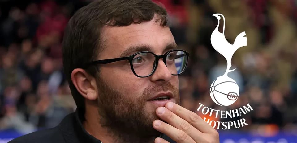 Man with glasses pondering during a match