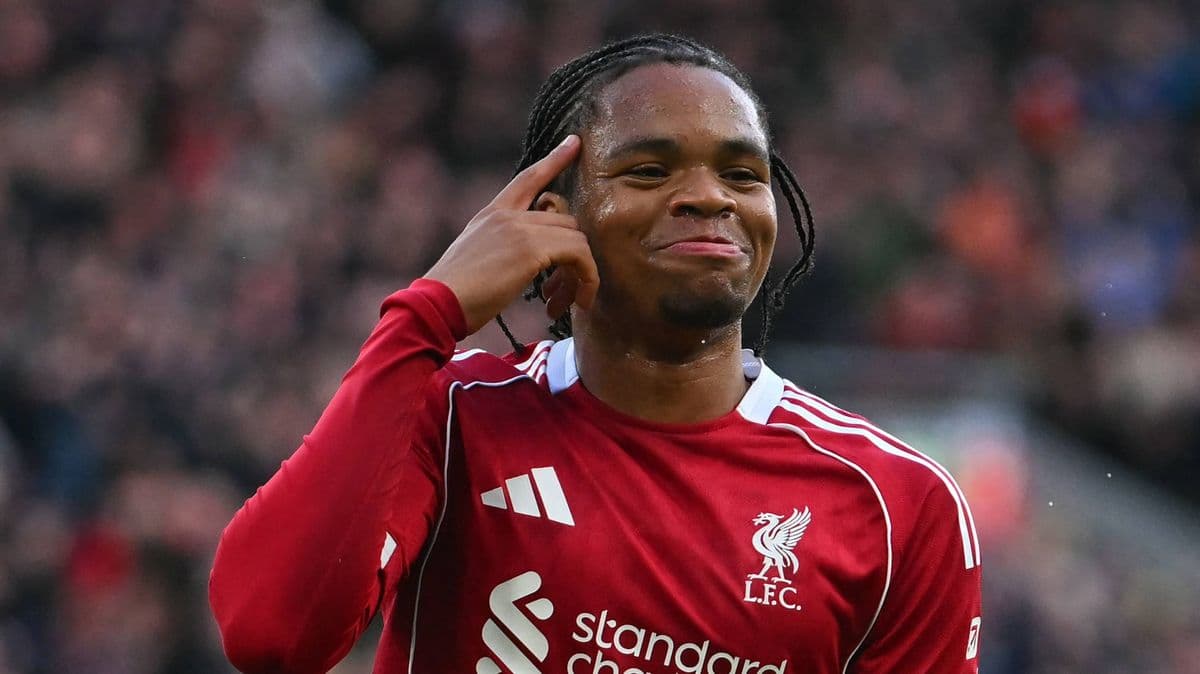 Player celebrating a goal with a hand gesture