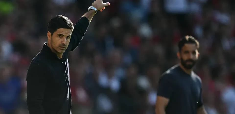 Manager directing players during match from sidelines