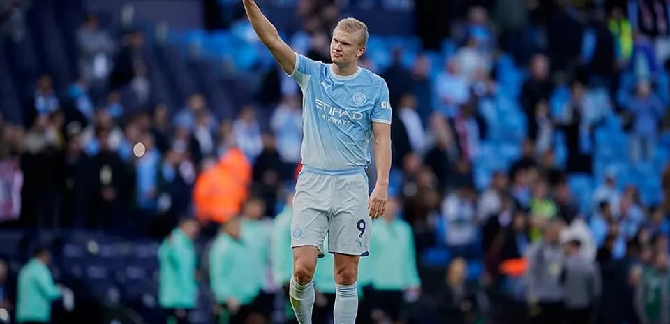 Player waving to fans after match
