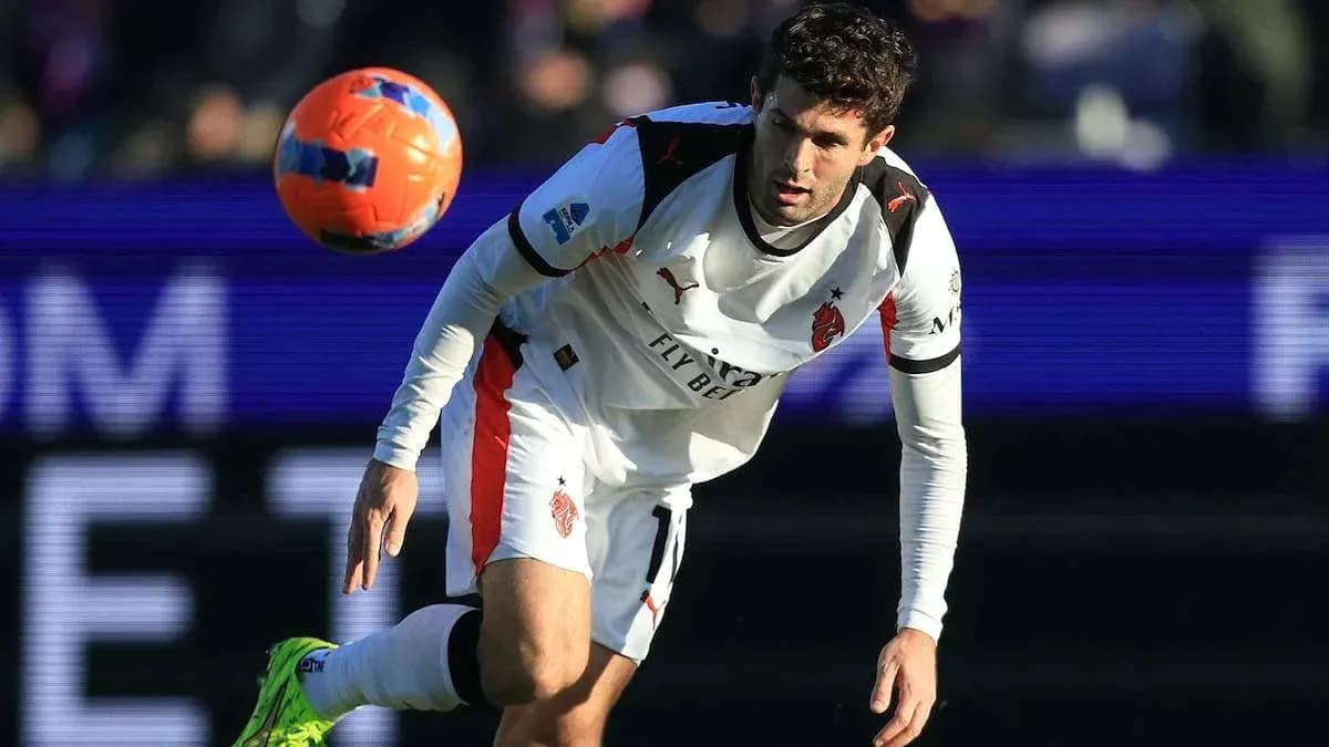 Player in action with ball during football match