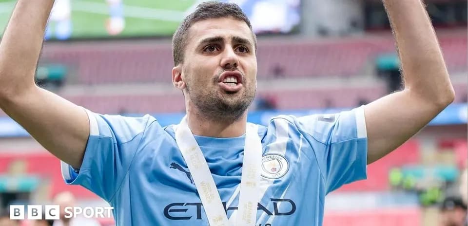 Player celebrating with medal after winning match