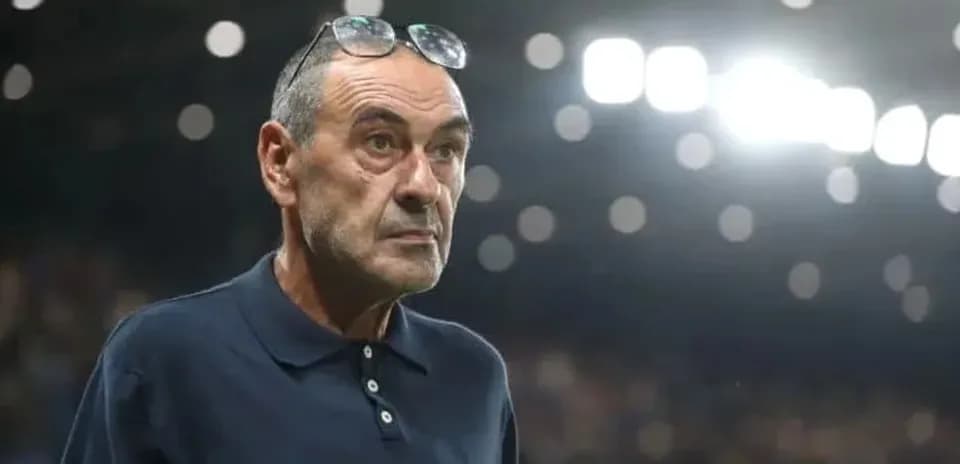 Coach observing the match with glasses on head