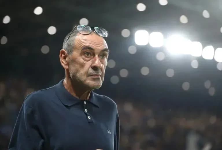 Coach observing the match with glasses on head