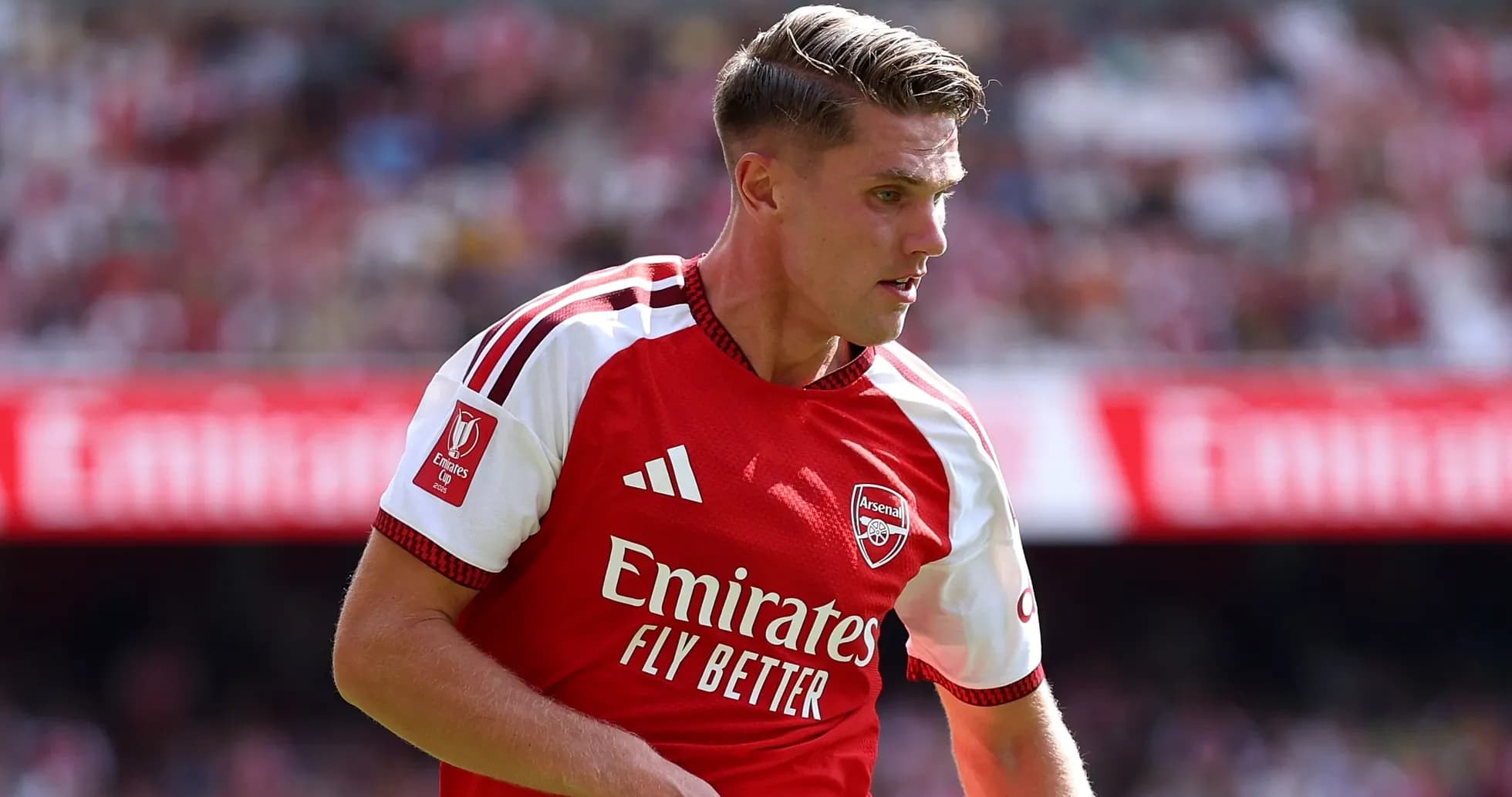 Player in Arsenal jersey during match action