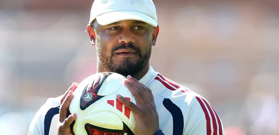 Player holding a soccer ball during practice session