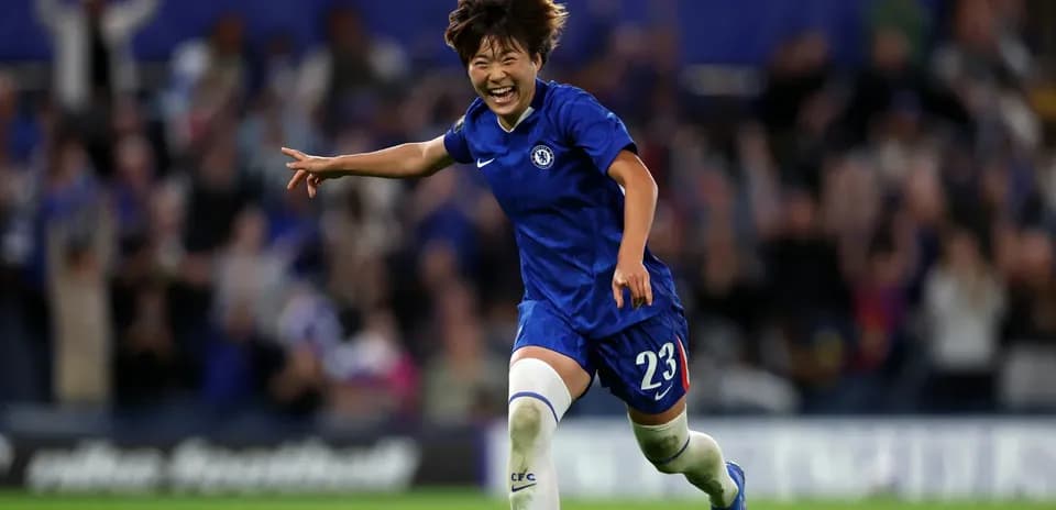 Chelsea player celebrating a goal on the pitch