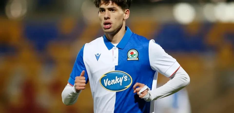 Player in Blackburn Rovers kit during match