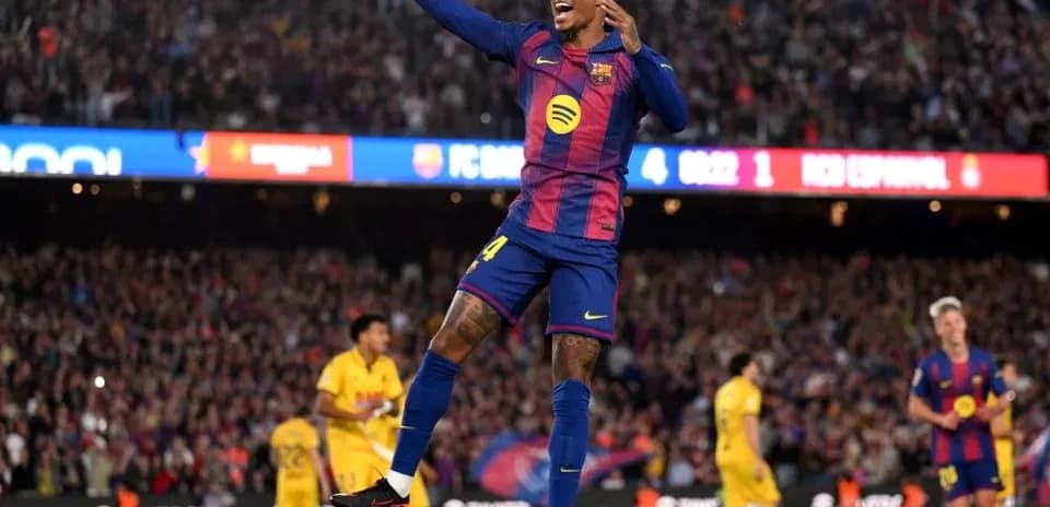 Barcelona player celebrating a goal at Camp Nou