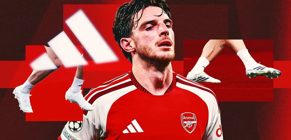 Arsenal player with red jersey and soccer cleats