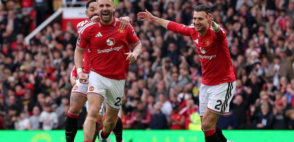 Manchester United players celebrating a goal