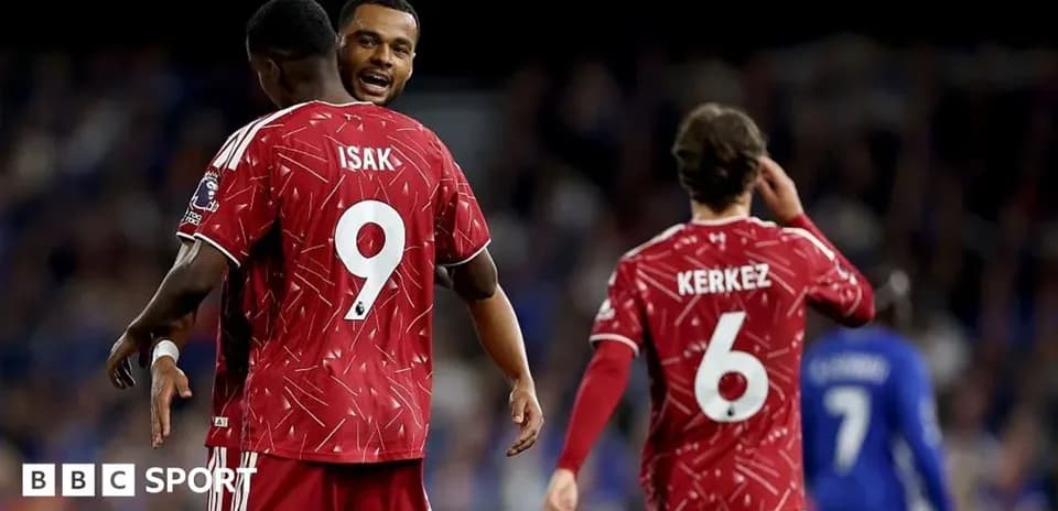 Players celebrating on the pitch during match