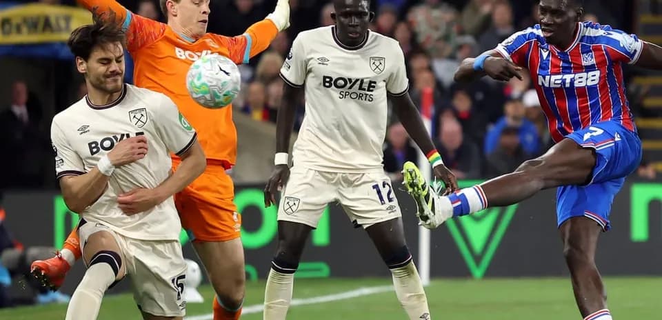 Crystal Palace player kicking the ball against West Ham
