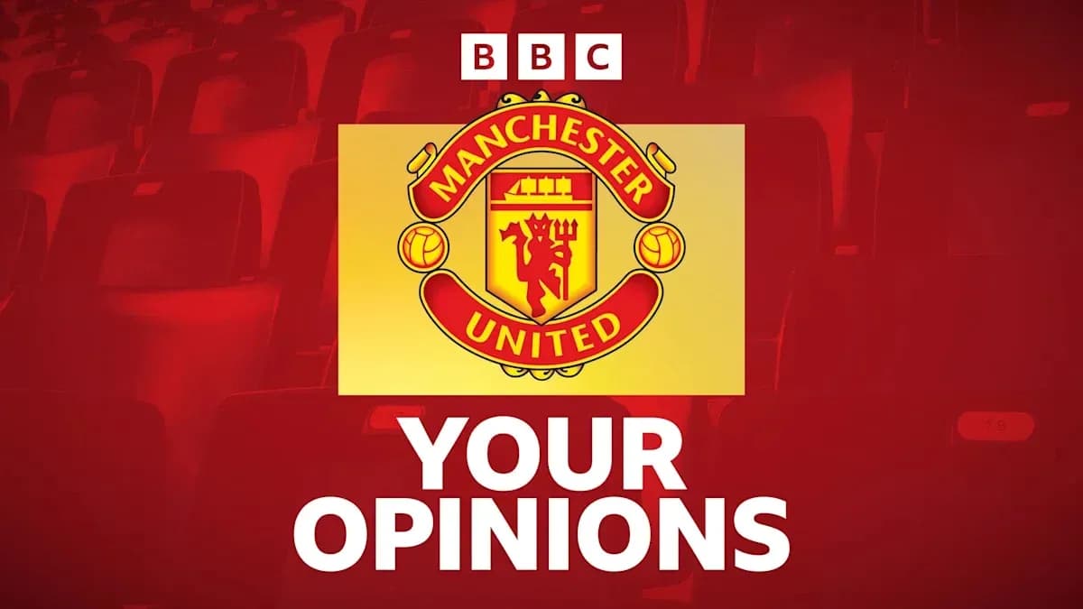 Manchester United logo with seating background