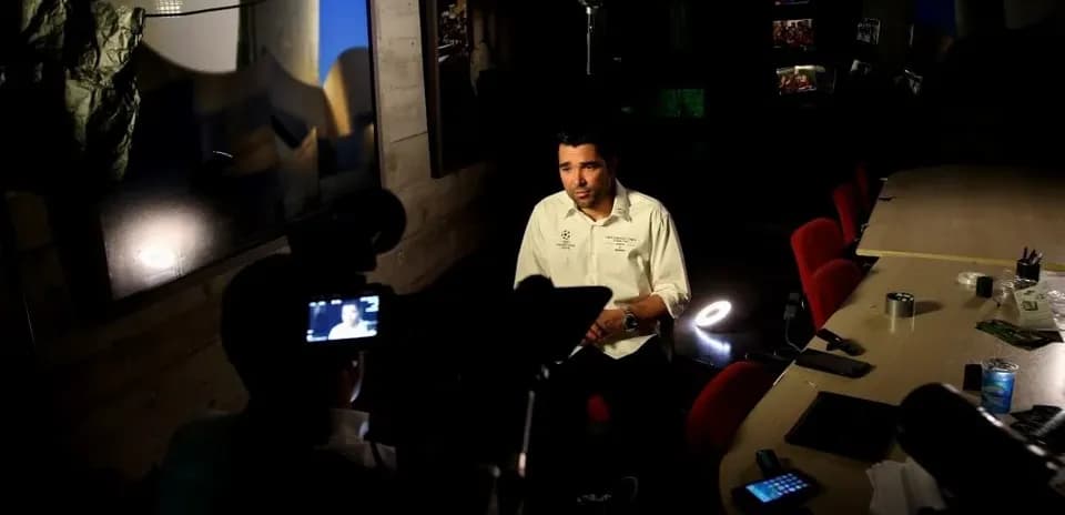 Interview setup with person speaking to camera