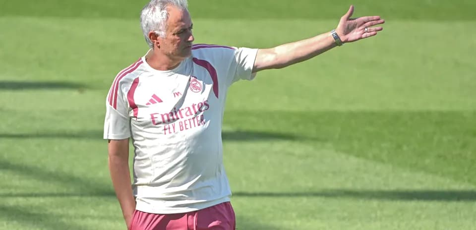 Coach giving instructions during training session