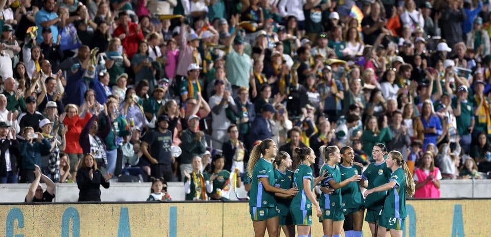 Celebration after goal during women's football match