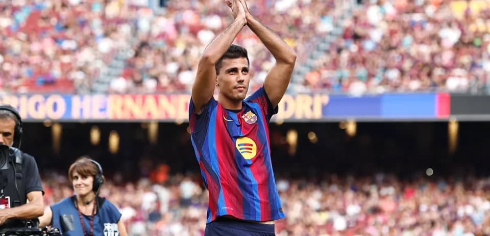 Player applauding fans during match at Camp Nou