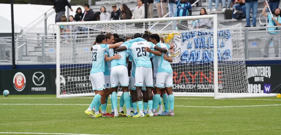 Monterey Bay players celebrating a goal