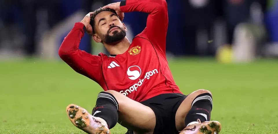 Player sitting on field in distress after injury