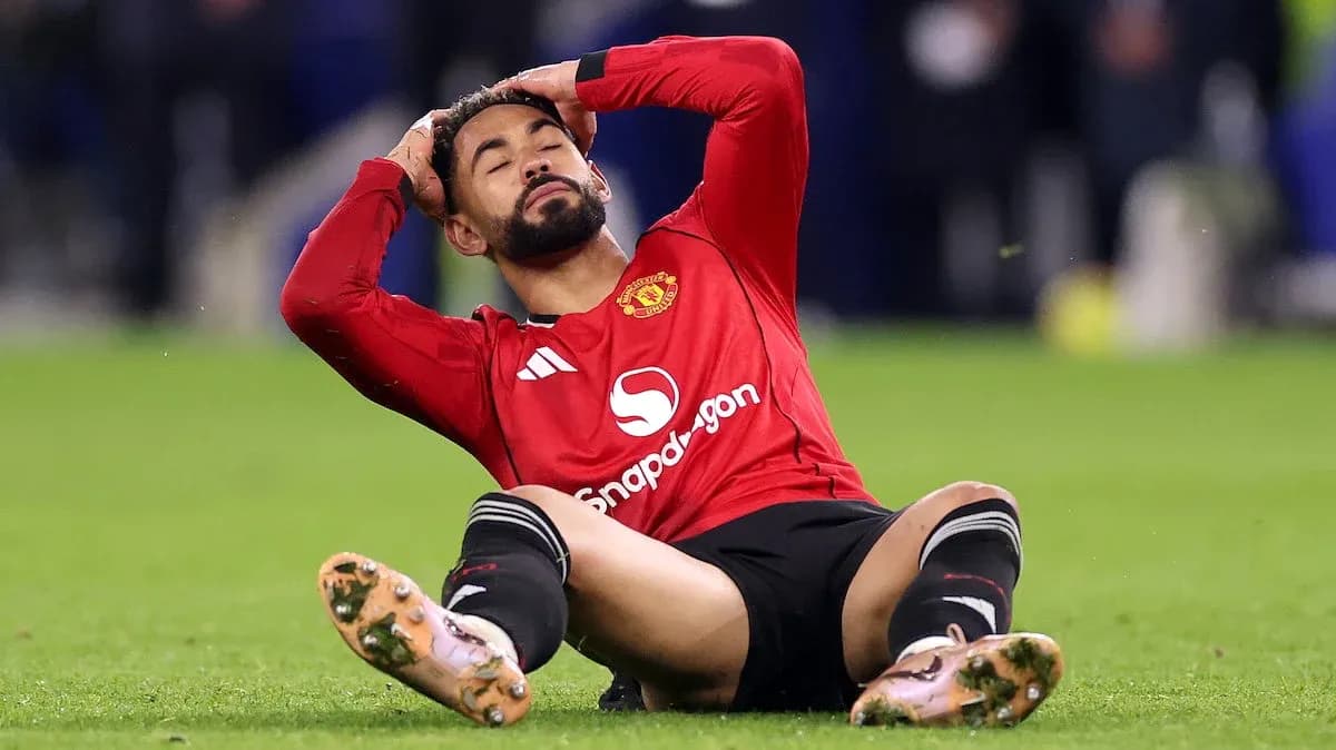 Player sitting on field in distress after injury