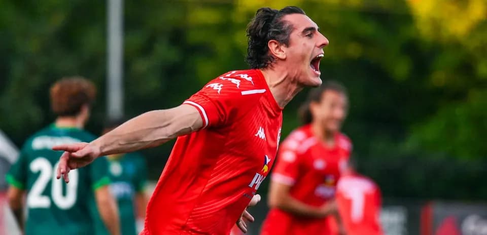 Player celebrating goal during Larne match